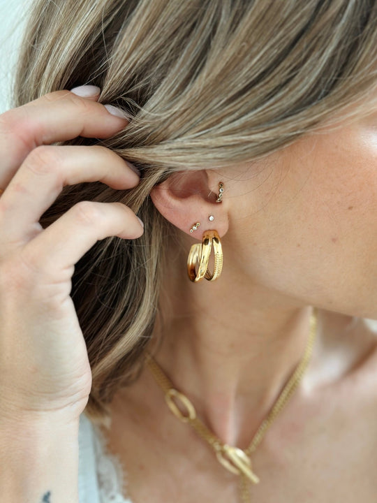 Les boucles d'oreilles Mila-Gualap